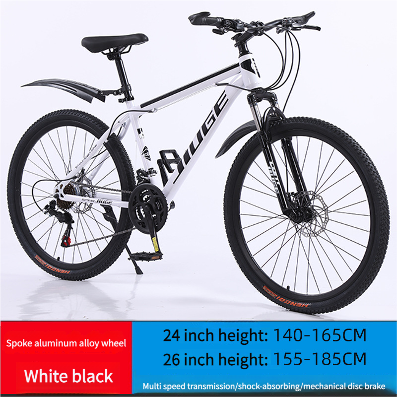 Mountain bike with rider height guide showing 24 inch and 26 inch size recommendations for adults.