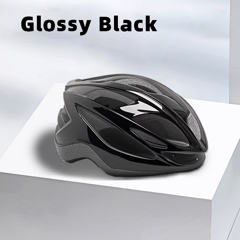 Glossy black bicycle helmet with multiple ventilation holes shown on a white display stand.