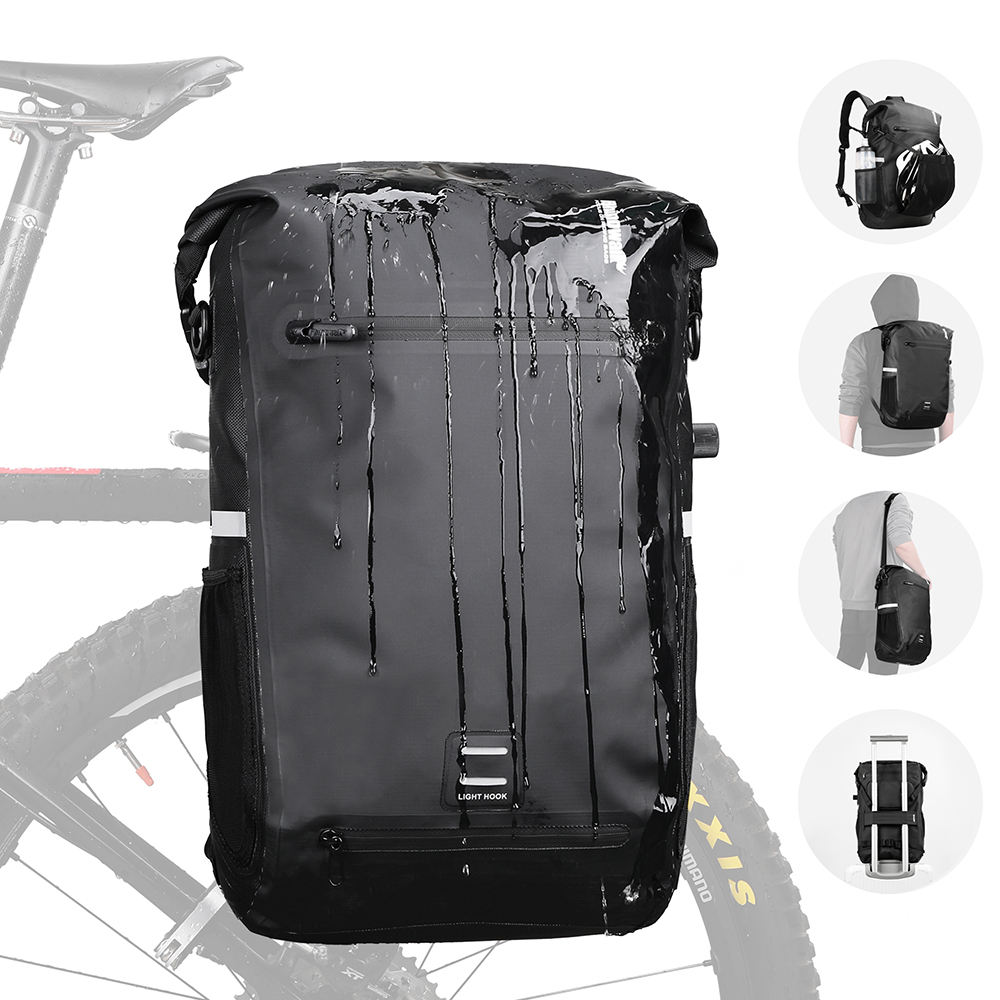 Black waterproof cycling backpack with roll-top closure, large capacity design, and multiple carrying styles including backpack and shoulder bag; water-resistant exterior with reflective details, suitable for commuting, cycling, and outdoor travel.